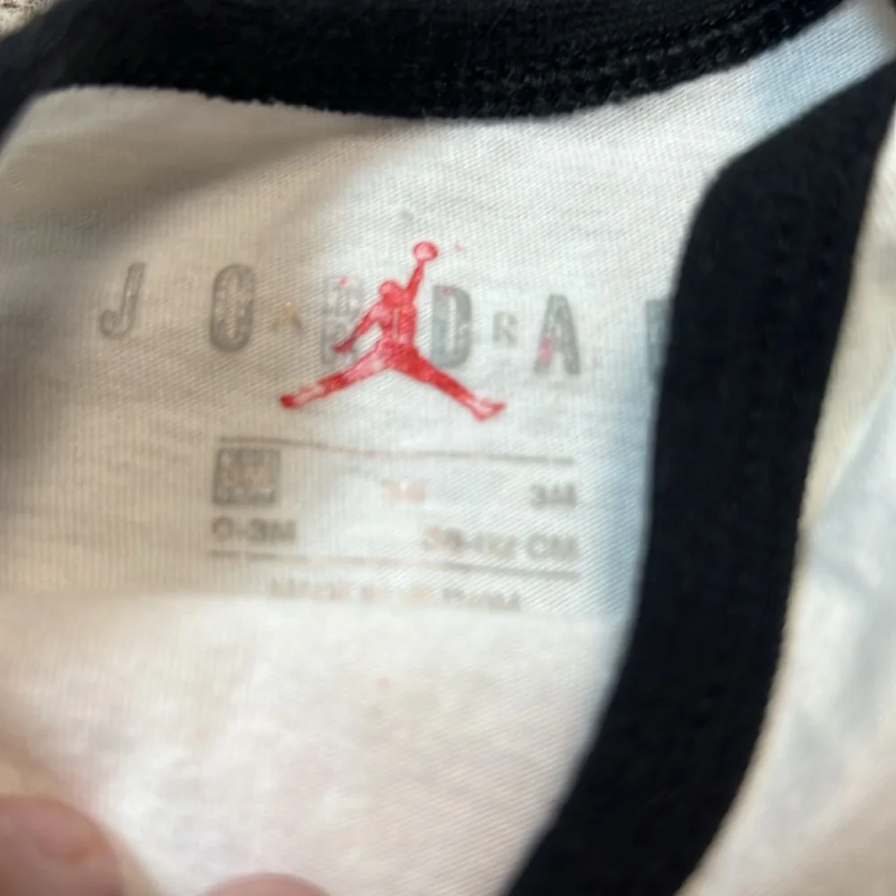Nike onesies‎